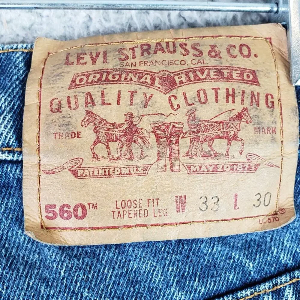 VTG Levis 560 Jeans Mens 33x30 Medium Wash Blue Loose Fit Tapered Leg Faded 90s